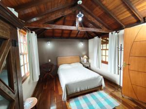 Postel nebo postele na pokoji v ubytování Recanto do Sitio