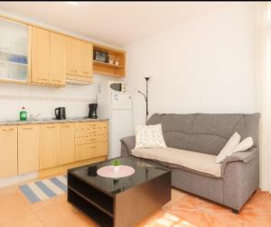 a living room with a couch and a coffee table at Loma Estrella Ocean Suite Upper Arguineguín in Arguineguín