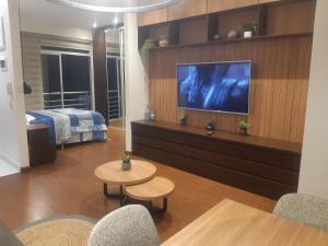 En eller flere senge i et værelse på Garzonier más Piscina