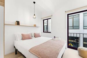 En eller flere senge i et værelse på Artistas House