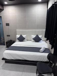 Postel nebo postele na pokoji v ubytování Hotel Tree