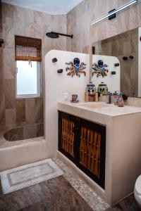 Koupelna v ubytování Ceiba Studios