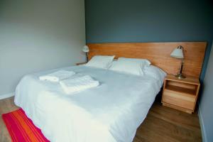 Giường trong phòng chung tại Panorama Aparts Chalten