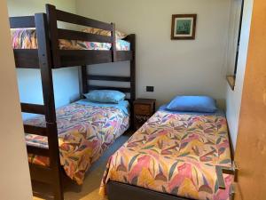 En eller flere senge i et værelse på Departamento con acceso directo a una playa exclusiva + 9 billeder