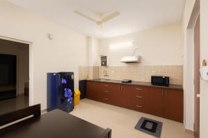 Kuchyň nebo kuchyňský kout v ubytování The Cozy Chapter