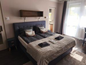 Postel nebo postele na pokoji v ubytování Katica Apartman