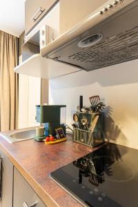 Køkken eller tekøkken på be Apart Serviced Apartments