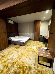 Ένα ή περισσότερα κρεβάτια σε δωμάτιο στο Alir