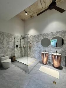 Koupelna v ubytování Rocka Villa Maenam