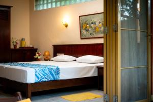 Postel nebo postele na pokoji v ubytování Ayurveda Spring Of Life Resort