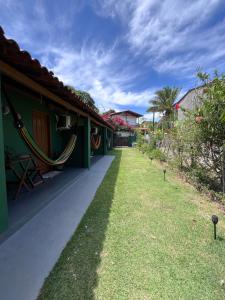 Un jardín fuera de Caju com Mel Hospedagem