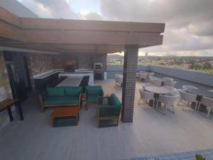 En balkon eller terrasse på Apart Makani Beach Flat Campas