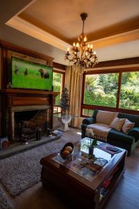 Et tv og/eller underholdning på Vivares Pousada Boutique Gramado