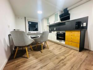 Кухня или мини-кухня в Gästehaus im Lindenweg
