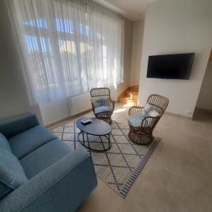 Et tv og/eller underholdning på Maison de charme spacieuse