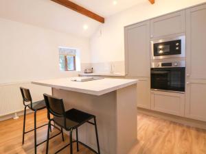 Kuchyň nebo kuchyňský kout v ubytování The Apple Store + 11 fotografií