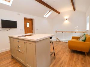 TV a/nebo společenská místnost v ubytování The Apple Store