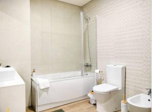 Et badeværelse på By the Sea + 31 billeder