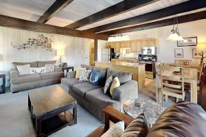 a living room with a couch and a table at Timberline Condominiums 3 Bedroom Standard Unit D2A in Snowmass Village
