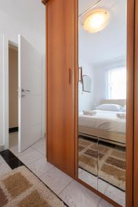 Ένα ή περισσότερα κρεβάτια σε δωμάτιο στο Nykolas