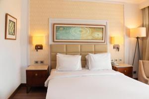 En eller flere senge i et værelse på Jaz Sharm Dream Vacation Club Time Share - Reservation only on Saturdays - Min stay 7 Days