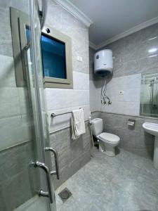 Koupelna v ubytování Nile Plaza Suites + 102 fotografií