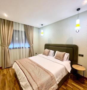 En eller flere senge i et værelse på Modern Jewel Casablanca Center