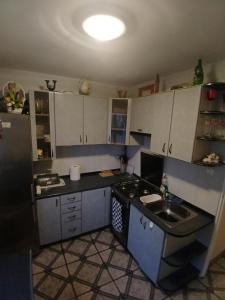 Køkken eller tekøkken på Mieszkanie Rumiankowa