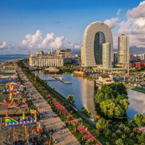 a view of a city with a river and buildings at Alliance palace Black Sea in Batumi +26 photos
