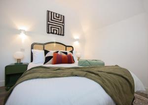 En eller flere senge i et værelse på Stylish Flat, Close To Tube, Fast Wifi