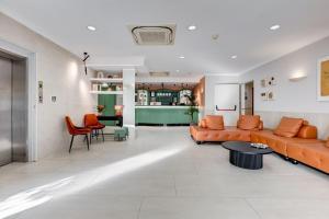 Posezení v ubytování Romoli Hotel + 22 fotografií