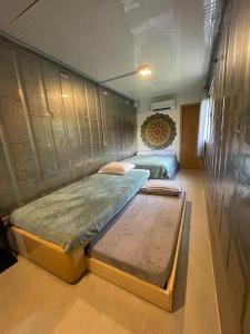 Giường trong phòng chung tại Estudio Praia do Estaleiro - Balneário Camboriú +7 ảnh