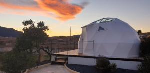a dome observatory on top of a building at Nyxia Dome in Caravaca de la Cruz