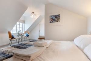 En eller flere senge i et værelse på 3 Bed in Padstow oc-p00397