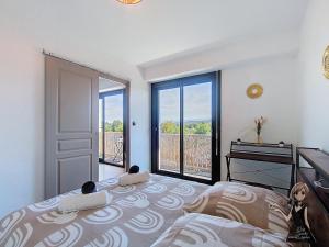 Postel nebo postele na pokoji v ubytování Le Panorama, vue exceptionnelle à 2 pas de la gare