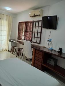 TV a/nebo společenská místnost v ubytování Loft São Pedro da Aldeia