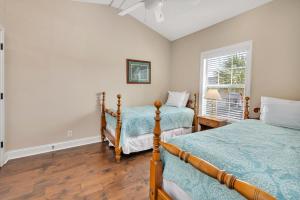 Postel nebo postele na pokoji v ubytování 1605 Mariners Circle