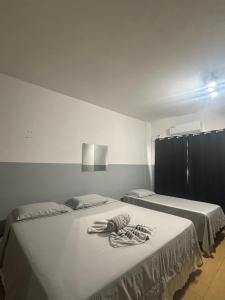 Ένα ή περισσότερα κρεβάτια σε δωμάτιο στο Hotel Centro