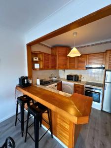 Kuchyň nebo kuchyňský kout v ubytování Azurara Beach + 43 fotografií