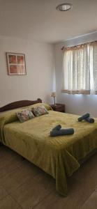 En eller flere senge i et værelse på Eco Apart - Hotel TDF