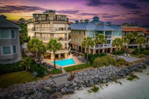 an aerial view of a large house with a swimming pool at Shiphouse 3 - Third Floor in Saint Simons