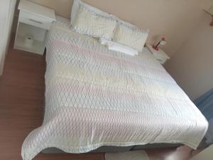 En eller flere senge i et værelse på C'ngela