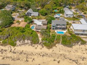 an aerial view of a house on the beach at 8 Stewart Lane in Jekyll Island