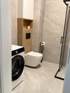 Koupelna v ubytování MG Rentals Ks Popiełuszki