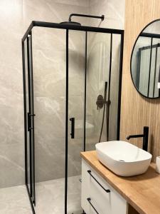 Koupelna v ubytování MG Rentals Ks Popiełuszki