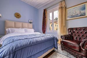 Postel nebo postele na pokoji v ubytování Theodoros Kolokotronis - Pandora