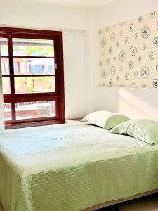 Postel nebo postele na pokoji v ubytování Apartamento Pé na área Praia do forte + 15 fotografií