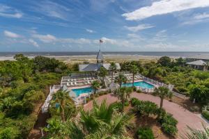 an aerial view of a resort with a swimming pool at 37 Coast - Ebb Tide Cottage in East End