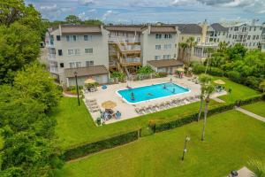 an overhead view of a pool at a apartment complex at Shipwatch #106 in East End