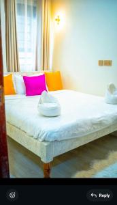 Postel nebo postele na pokoji v ubytování milimaniluxestay